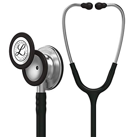 A Littmann stethoscope rests on a white background; its chest piece and tubing are silver and black.
