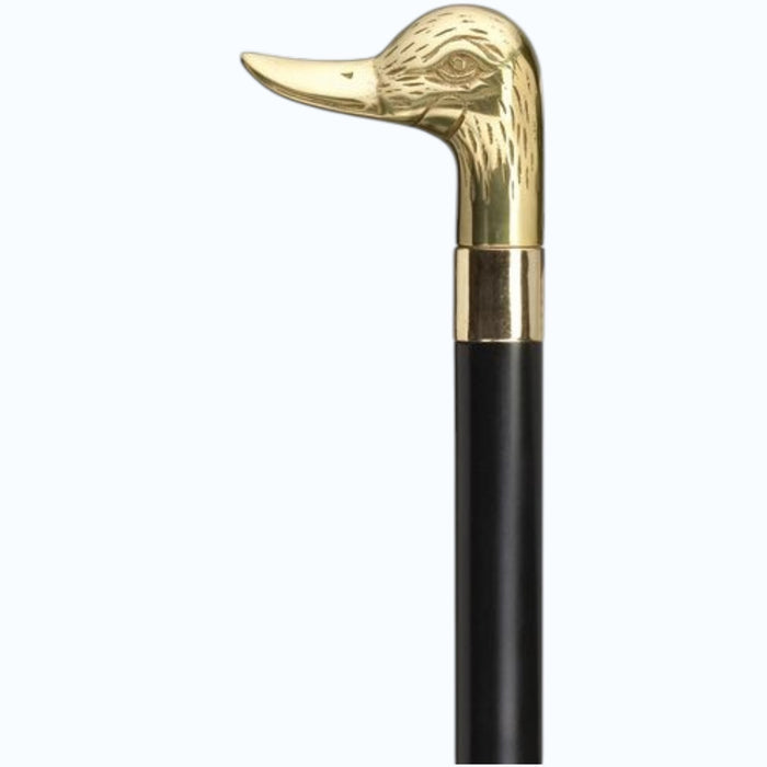 The HARVY CANES - BRASS DUCK HEAD CANE by HARVY CANES features a black hardwood shaft and a shiny brass duck head handle with engraved feather details and a smooth, elegant finish.