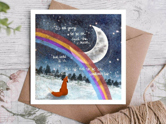 Greeting Card featuring a fox and rainbow with a supportive message about being okay, by Fox Under The Moon.