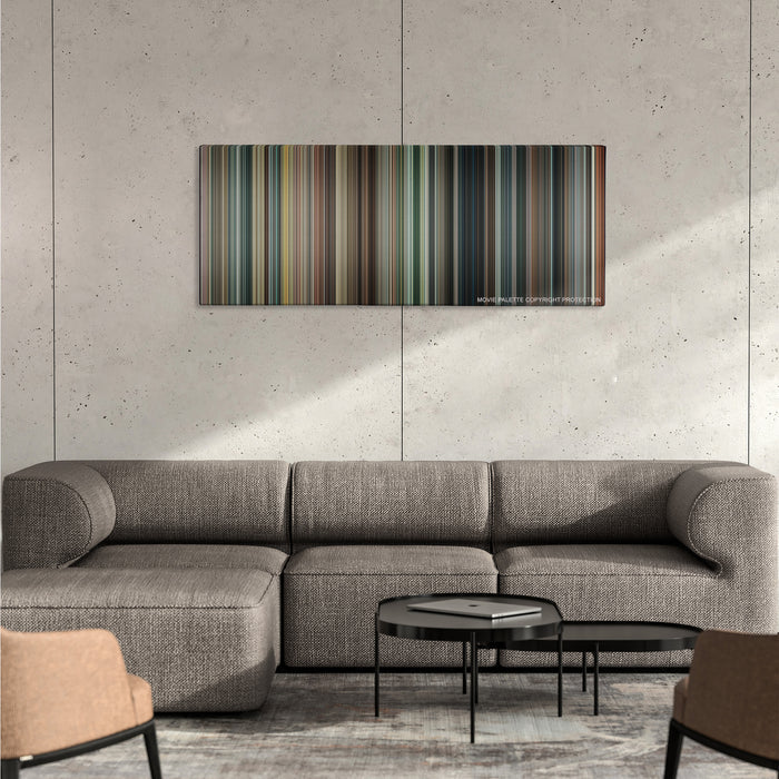 RED 2 color palette canvas on a concrete wall above a gray sectional sofa