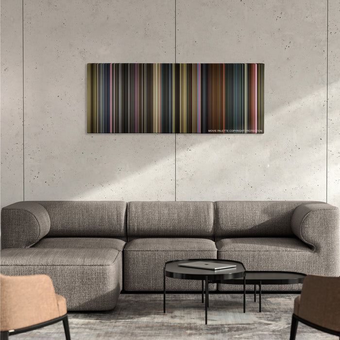 X-Men: Dark Phoenix color palette canvas on a concrete wall above a gray sectional sofa